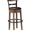 Ashley Dining Room Pinnadel Grayish Brown Tall Upholstered Swivel Barstool