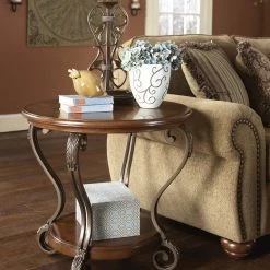 Ashley Living Room Nestor Medium Brown Round End Table