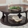 Ashley Rogness Rustic Brown Round Cocktail Table Living Room