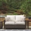 Ashley Outdoor Paradise Trail Medium Brown Loveseat W/Cushion