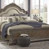 Ashley Charmond Queen Upholstered Bed - Brown