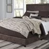 Ashley Dolante - Brown - King Upholstered Bed